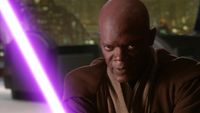 Samuel L. Jackson holding purple lightsaber as Mace Windu